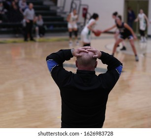 A Girls High School Basketball Coach Displays His Frustration. 