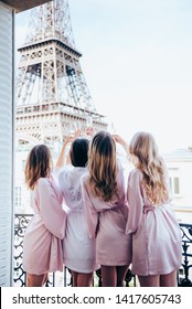 Girls In The Hotel In Paris Celebrating Bachelorette Party And Drinking Champagne In Front Of The Eiffel Tower At The Balcony In A Hotel With The Gorgeous View