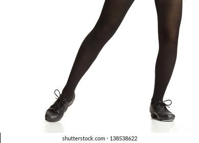 Girl's Legs and Feet Posing in Tap Shoes and Black Tights
