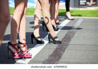 Girls Legs In High Heels On The Starting Grid