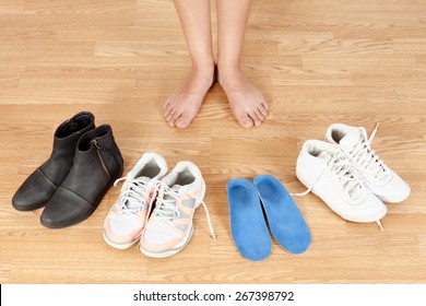 the girl's legs and orthotics