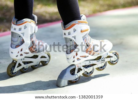 Similar – Woman in roller blades in skate park