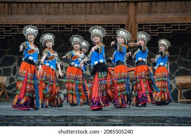 Girls in Miao Nationality Clothes Dancing in Thousand Miao Villages Xijiang, Leishan County, Miao and Dong Autonomous Prefecture in southeast Guizhou Province, China in March 2018