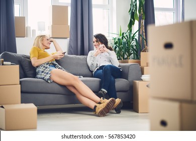 Girls moving into new apartment - Powered by Shutterstock