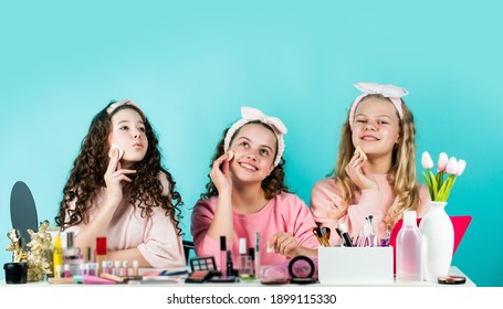 Girls only. Childhood happiness. Kids makeup. Skin care concept. Cosmetics for children. Beauty and fashion. Happy girls doing makeup together. Sisterhood happiness. Happy womens day. Cosmetics shop.