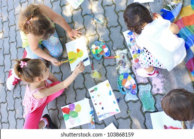 Girls Painting Outside