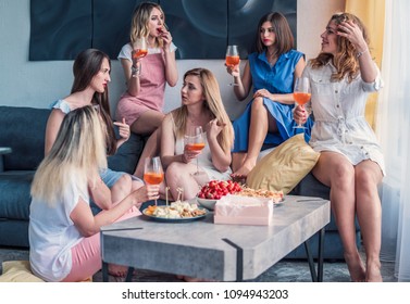 Girls Party. Beautiful Women Friends Having Fun At Bachelorette Party. They Are Celebrating And Drinking Champagne At Hen Part