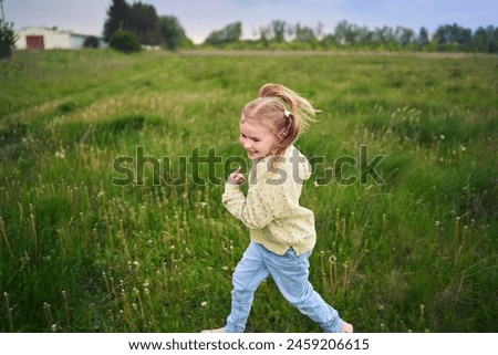 Similar – Small child with long blond hair