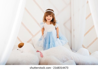 Girls Playing On The Bed With A Big Soft Toy Teddy Bear