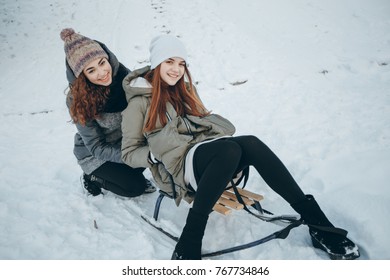 Girls sledding and fun to spend time