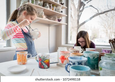 Girls And Their Hobby Pottery Painting