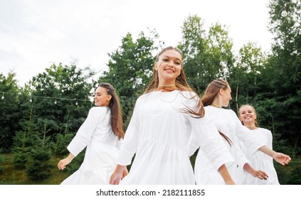 Girls In White Dresses Dance On The Square