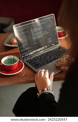 A girls working behind the computer