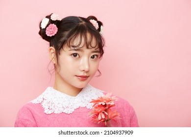 Girly Portrait Of Young Asian Woman On Pink Background