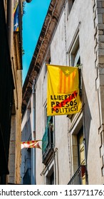 Girona, Spain - July 10, 2018: Catalonia Independence Flags On Balconies. The Catalan Independence Movement Is A Political Movement Historically Derived From Catalan Nationalism