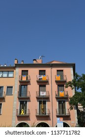 Girona, Spain - July 10, 2018: Catalonia Independence Flags On Balconies. The Catalan Independence Movement Is A Political Movement Historically Derived From Catalan Nationalism