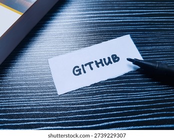 Github writting on table background. 