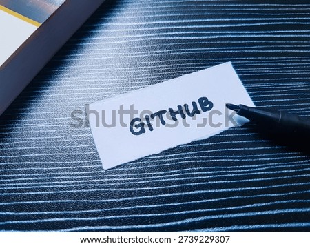 Github writting on table background. 