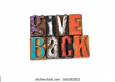 Give Back. Charity, Donation And Compassion Concept. Colored Wooden Letters On A White Background
