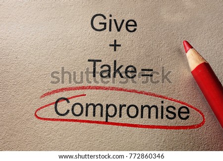 Give and Take Compromise text on paper with pencil                               