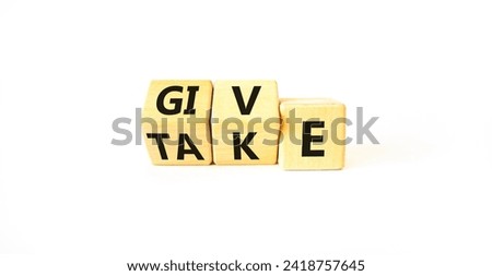 Give or take symbol. Concept word Give or Take on wooden cubes. Beautiful white table white background. Business give or take concept. Copy space.