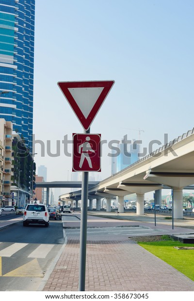 Give way to pedestrians\
sign in UAE