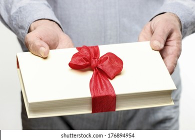 Giving book as a present