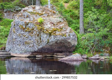 Glacial Erratic Rock Located On A Beach