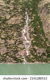 A Glacial Stream That Flows Into The Grimselsee In Switzerland