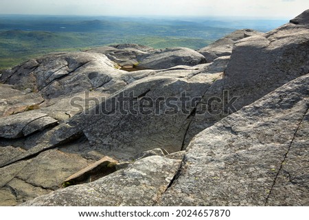 Glacially sculpted granite bedrock near the summit of Mt. Monadnock in Jaffrey, New Hampshire.