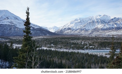 The Glacier Delta River Flows And The Snow Capped Alaska Range, Interior Alaska.