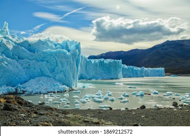 Glacier Ice Wall On The Lake And Mountains