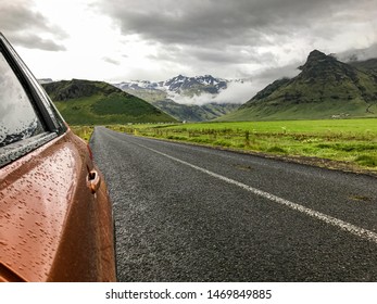 Glacier In Iceland Seen From The Window Of A Car On The Highway.  Road Trip Concept.  The Road Less Traveled.