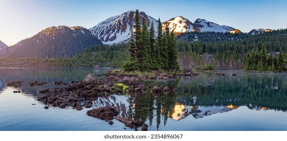 Glacier Lake with trees and Canadian Mountain Landscape. Garibaldi Lake, Whistler, British Columbia, Canada.
