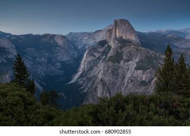 Glacier Point View of scenic Yosemite Valley with famous El Capitan and Half Dome rock climbing summits in beautiful golden  light at sunset in summer, Yosemite National Park, California, USA