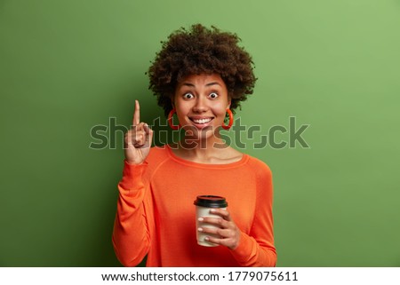 Similar – Image, Stock Photo Hand holding coffee, woman drinking in background