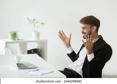 Glad Company Ceo Satisfied With Achievement Looking At Laptop Screen, Excited Businessman In Suit Motivated By Business Win Feels Relieved Figuring Out Online Project Result Watching Good News On Pc