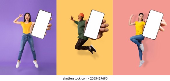 Glad excited young asian, european women and black guy jumping from joy and show phone with empty screen, isolated on colored background, collage. Great advice, offer and digital ad, new app, panorama - Shutterstock ID 2055419690