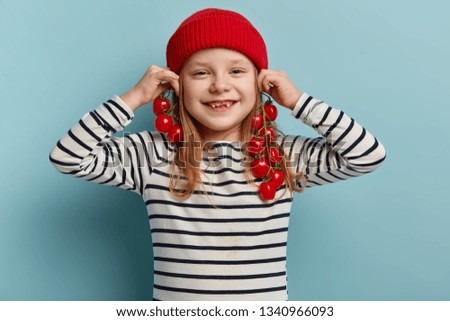 Similar – Image, Stock Photo portrait adorable child eating chocolate sponge cake