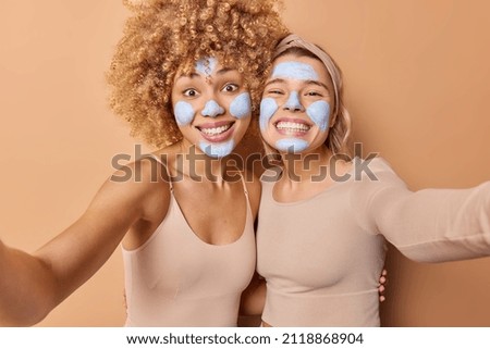 Similar – Image, Stock Photo woman making cuddles to her cute dog sleeping on bed