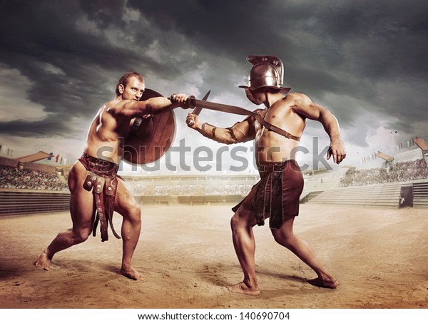 Gladiators\
fighting on the arena of the\
Colosseum