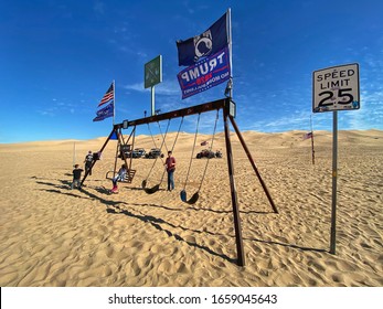 Glamis, CA/ USA -  January 2020: Offroaders enjoying a swing set in the middle of the imperial dunes