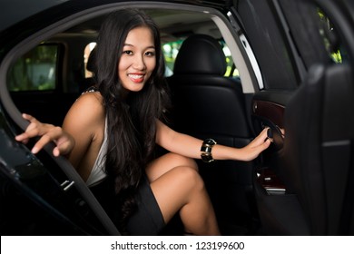 Glamorous Beauty Sitting In A Lux Car