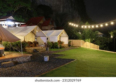 glamorous camping tent in the middle of the forest
 - Shutterstock ID 2312029769