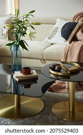 Glamorous Living Room Interior Design With Modern Beige Sofa, Glass Coffee Table And Golden Accessories. Beauty In The Details. Template. 
