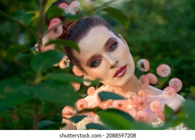 Glamorous Photo Session With Dandelions. Beautiful Girl And Dandelions. Summer Beauty. Tender Girl In The Garden Of Eden. Bird Of Paradise.