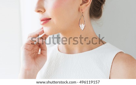 Similar – woman with earring