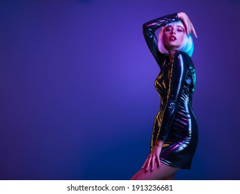 Glamour fashion girl . Stylish blonde in shiny dress. Full-length portrait of beautiful  fashionable woman in shining dress, space concept. Art portrait  of  an young attractive model. Fantasy style - Shutterstock ID 1913236681