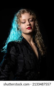 Glamour Studio Portrait Of A 21 Year Old White Blonde Woman With Curling Hair