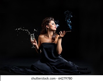 Glamour Women With Champagne And Cigarette On Black